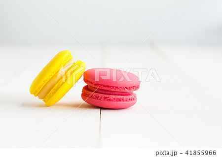 Colorful Macaroons on white wooden background. Colorful Macaroons on white wooden background. 41855966