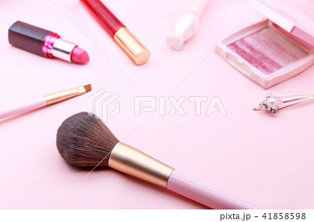 Make up products on pink background. Make up products on pink background. 41858598