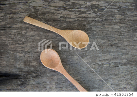Spoon wood on wooden texture. Spoon wood on wooden texture. 41861254