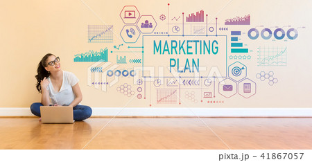 Marketing plan with young woman using a laptop computer  41867057