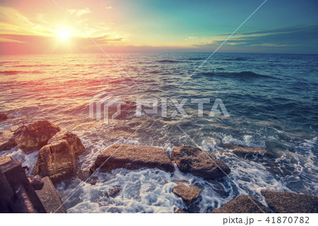 Rocky seashore in evening 41870782