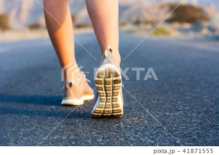 Running in the desert low angle view Running in the desert low angle view 41871555