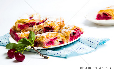 Homemade cherry sweet pie slices on a plate Homemade cherry sweet pie slices on a plate 41871713
