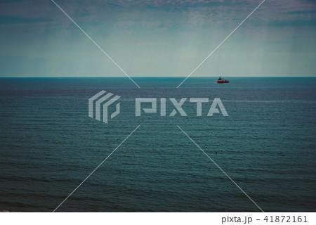 Container ship at anchor on the horizon 41872161