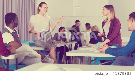 Students enjoying free time in class Students enjoying free time in class 41879382