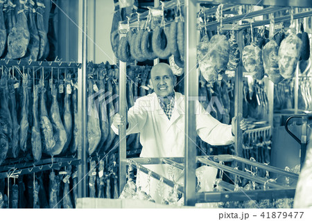 butcher hanging wurst and jamon 41879477