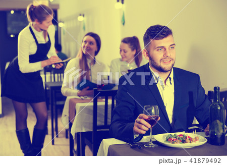 Man is dinnering in luxury restaurante alone 41879492