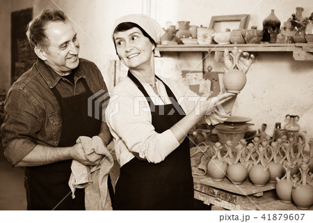 Two potters in the process of work Two potters in the process of work 41879607