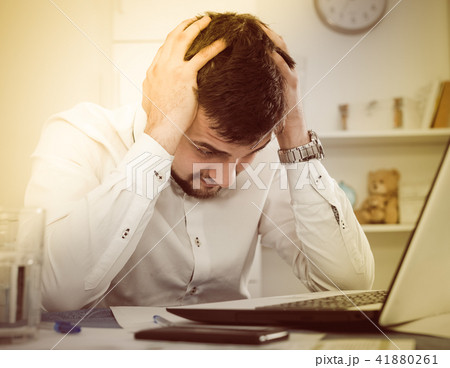 Man having problem in office 41880261