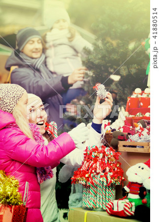 Parents with kids at X-mas market. Parents with kids at X-mas market. 41880514