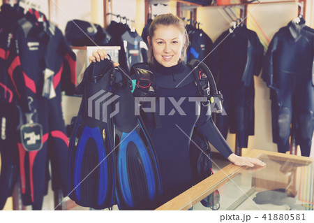 Woman is standing in new equipment for diving 41880581