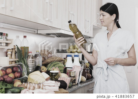Portrait of cheerful woman with oil Portrait of cheerful woman with oil 41883657
