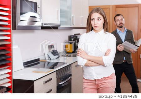 Woman unhappy with prices Woman unhappy with prices 41884439