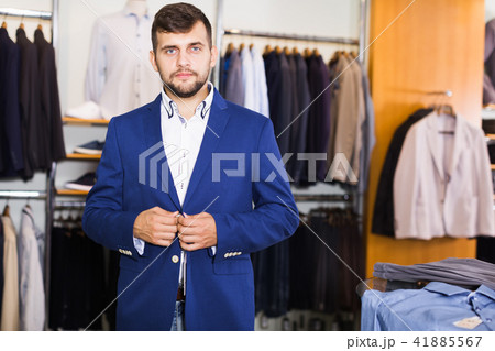 man choosing fashion jacket man choosing fashion jacket 41885567