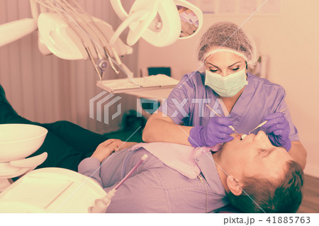 woman in uniform health tooth 41885763