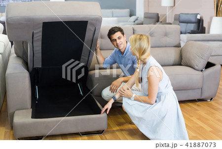 Portrait of family who are looking new sofa-transformer Portrait of family who are looking new sofa-transformer 41887073