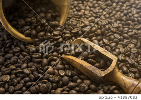 coffee beans in a wooden scoop and bowl coffee beans in a wooden scoop and bowl 41887083