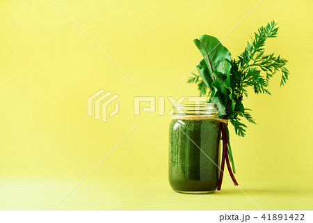 Smoothie with beet greens and carrot tops on Smoothie with beet greens and carrot tops on 41891422
