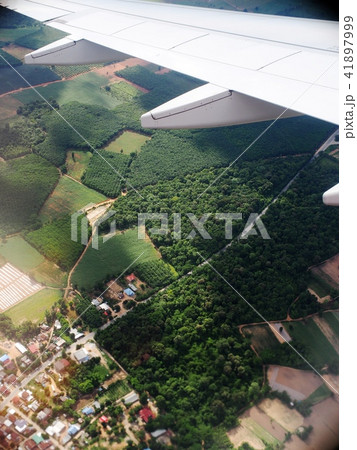 crop view of a white silver metallic airplane wing crop view of a white silver metallic airplane wing 41897999