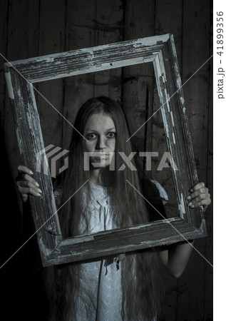 Horror girl in white dress 41899356