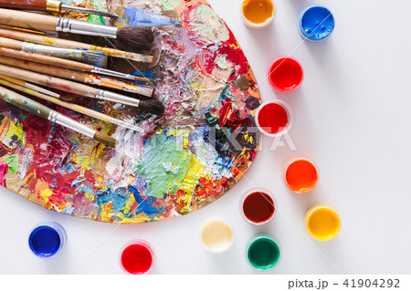 Art palette with colorful paint strokes, isolated 41904292