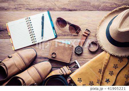 Clothing and accessories for men on wood floor 41905221