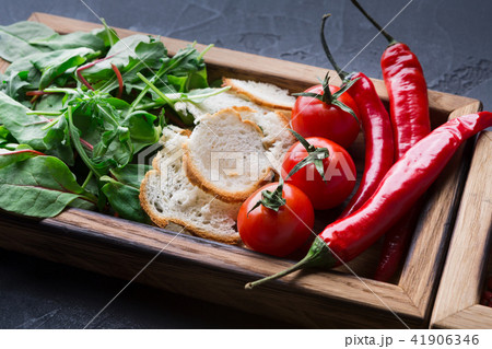 Cooking ingredients in wooden box on dark background 41906346
