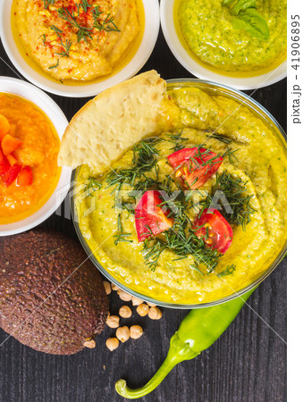 assorted hummus with vegetables 41906895