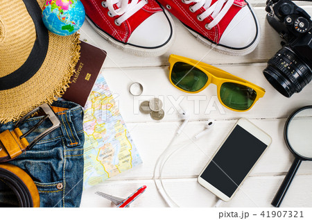Travel accessories and costume on white background 41907321
