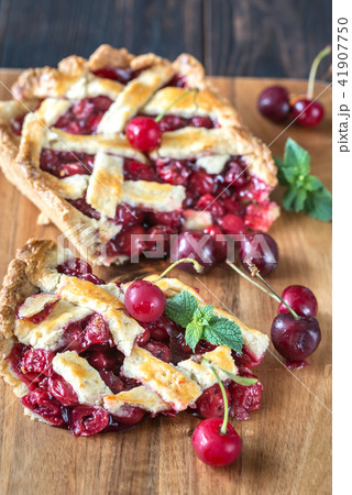 Cherry pie on the wooden board Cherry pie on the wooden board 41907750