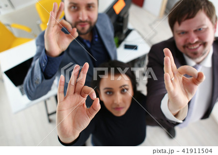 portrait of cheerful young businessmen in office portrait of cheerful young businessmen in office 41911504
