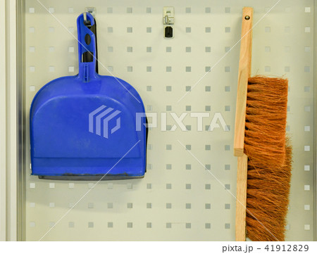A broom and a cleaning shovel A broom and a cleaning shovel 41912829