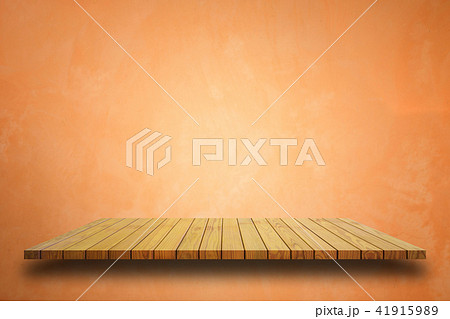 Empty top wooden shelves and stone wall background 41915989