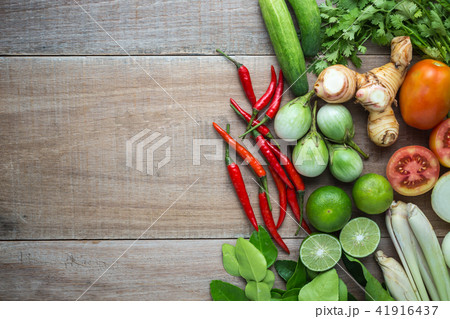 Mix of Thai vegetable in bamboo tray on wooden background. 41916437