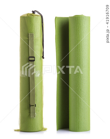 New green soft Yoga mat. Studio shot isolated on white New green soft Yoga mat. Studio shot isolated on white 41916709