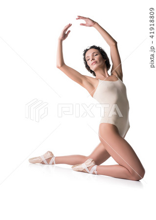 Graceful girl on pointe on the floor isolated view Graceful girl on pointe on the floor isolated view 41918809