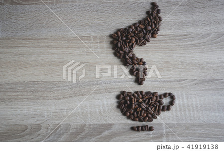 coffee beans in form of coffee cup and smell smoke coffee beans in form of coffee cup and smell smoke 41919138