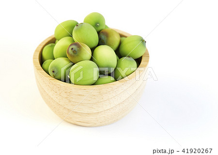 Lotus seeds put in a wooden cup Lotus seeds put in a wooden cup 41920267
