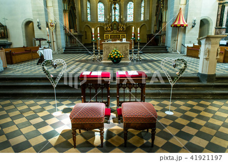 Wedding arrangement chairs inside The Basilica of St. Castor oldest church in Koblenz German state Wedding arrangement chairs inside The Basilica of St. Castor oldest church in Koblenz German state 41921197