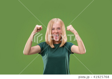 Winning success woman happy ecstatic celebrating being a winner. Dynamic energetic image of female 41925768
