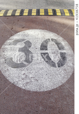 Traffic sign on asphalt Traffic sign on asphalt 41938758