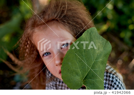 The baby is 4 years old, with blue eyes and small curls. Children's enjoyment of life and adventures The baby is 4 years old, with blue eyes and small curls. Children's enjoyment of life and adventures 41942066