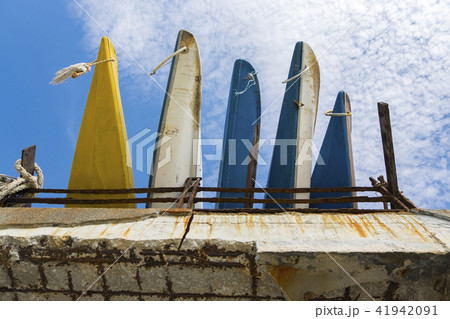 stacking kayaks over cloudy sky background stacking kayaks over cloudy sky background 41942091