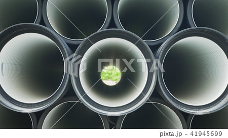 Warehouse of finished plastic pipes industrial outdoors storage site. Manufacture of plastic water Warehouse of finished plastic pipes industrial outdoors storage site. Manufacture of plastic water 41945699