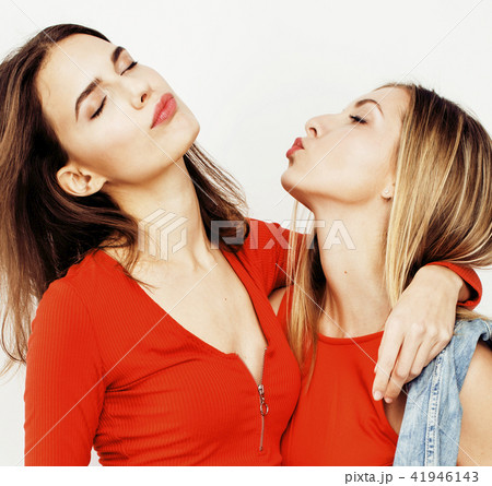 best friends teenage girls together having fun, posing emotional on white background, besties happy 41946143