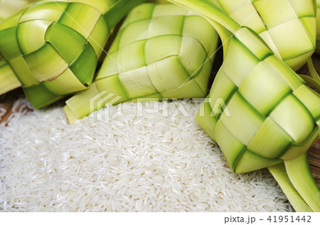 ketupat casing and rice in bamboo container ketupat casing and rice in bamboo container 41951442