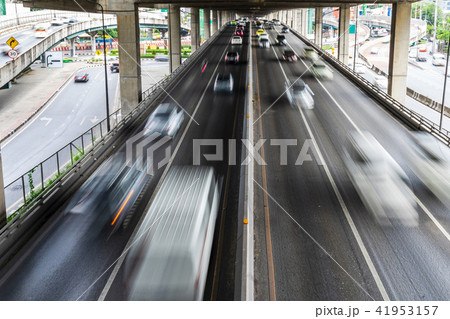 Motion blur of car on the road in the city 41953157