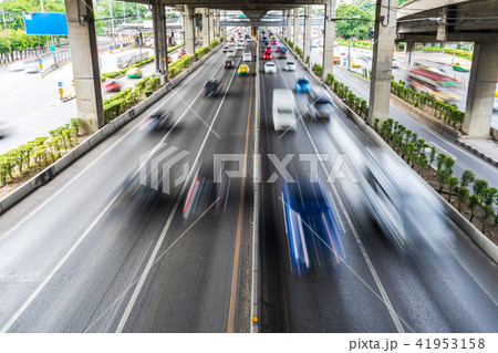 Motion blur of car on the road in the city 41953158