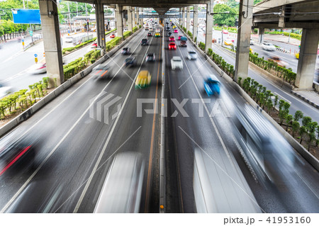 Motion blur of car on the road in the city 41953160