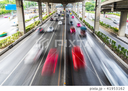 Motion blur of car on the road in the city 41953162